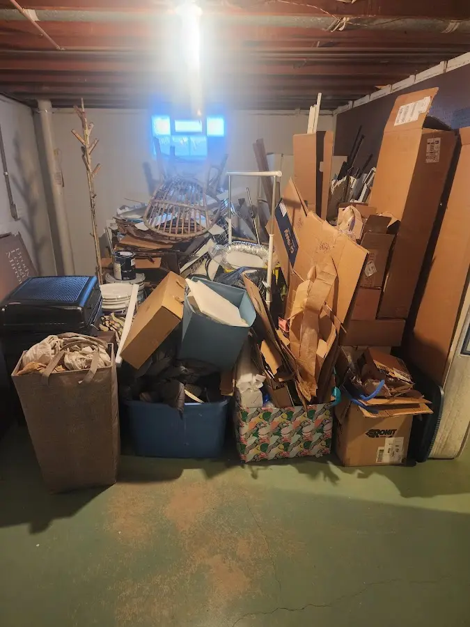 Roll-off dumpster container at job site for 2 Yard Dumpster Rental in Van